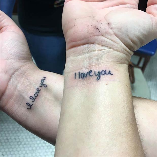 Mother and daughter matching heart tattoo placed on