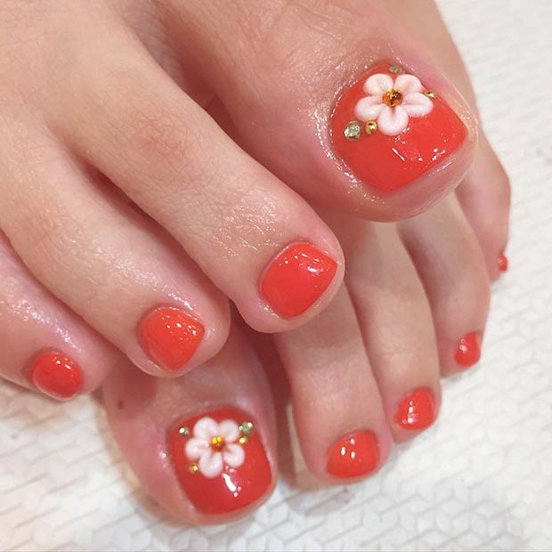 Orange Toe Nails with Flowers 