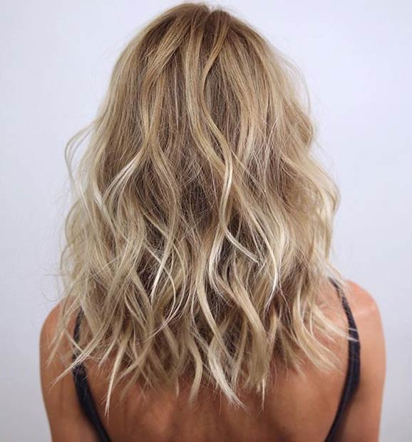 Messy and Curly Blonde Lob Hairstyle