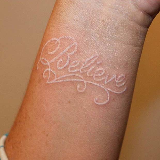 White Ink Believe Wrist Tattoo
