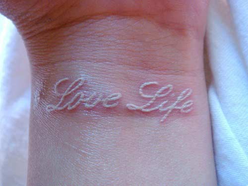 White Ink Wrist Tattoo Idea