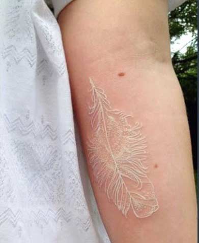 White Ink Feather Arm Tattoo Idea