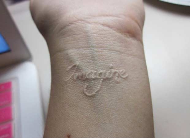 White Ink Imagine Tattoo