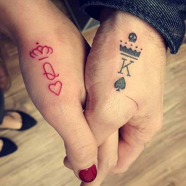 heart tattoos on hand for couples