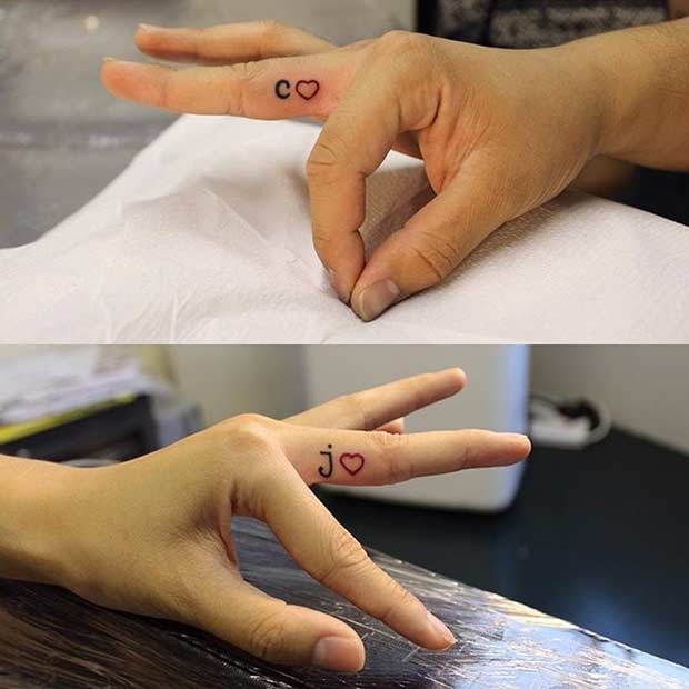 Minimalist matching heart tattoo on the wrist