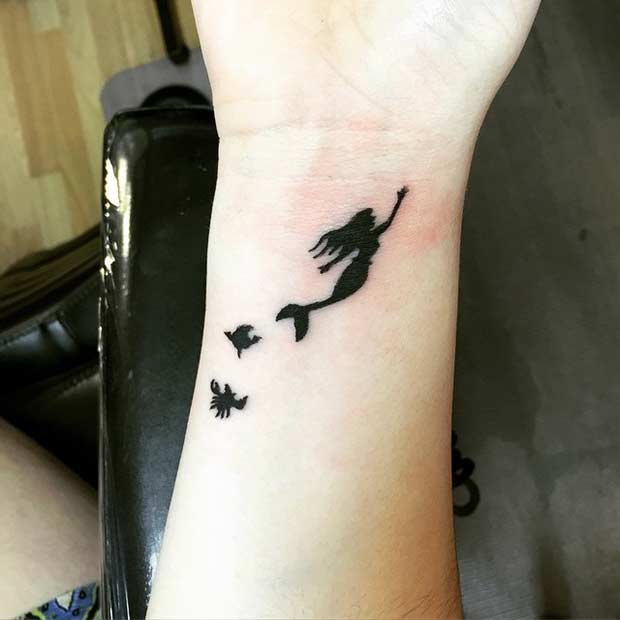All Black Little Mermaid Wrist Tattoo