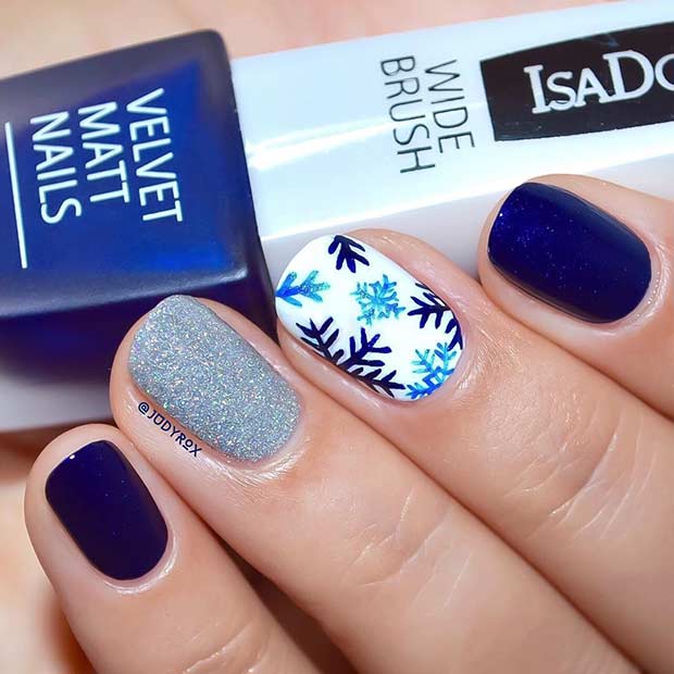 Navy Blue Snowflake Winter Nail Design