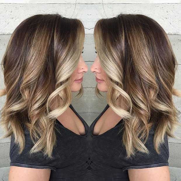 medium length brown hair with blonde highlights