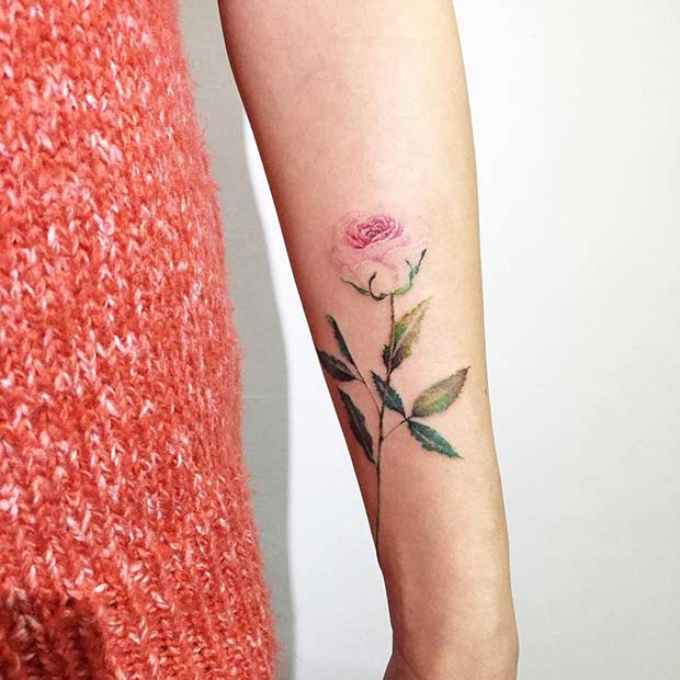 minimalist watercolor flower tattoo