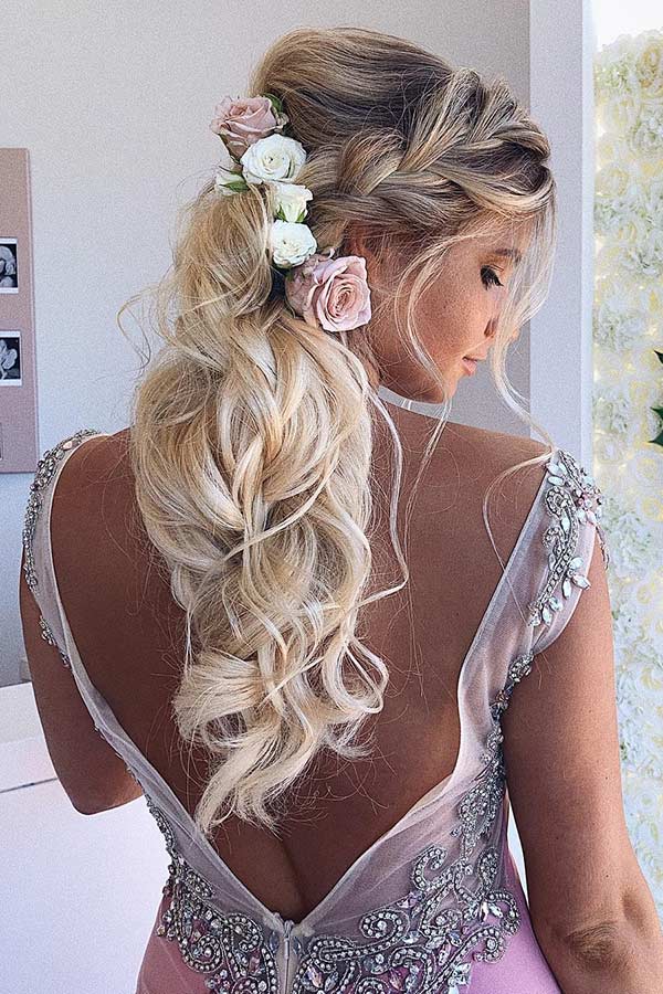 Elegant Ponytail with a Side Braid and Flowers