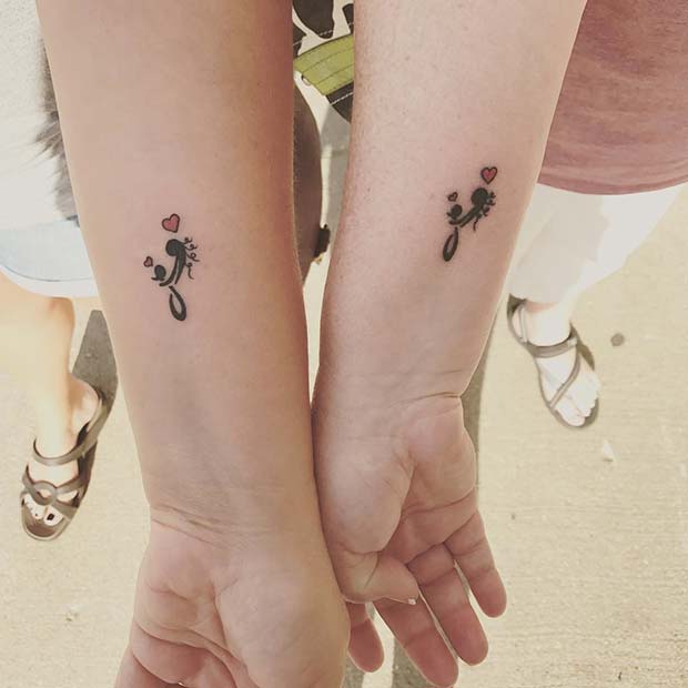 Mother and Child Tattoo Design for Popular Mother Daughter Tattoos