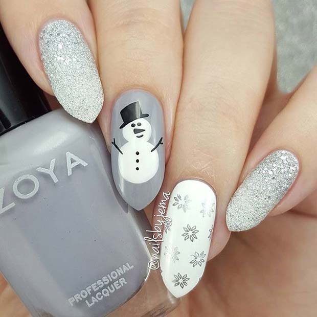 Silver Glitter and Snowman Nail Design