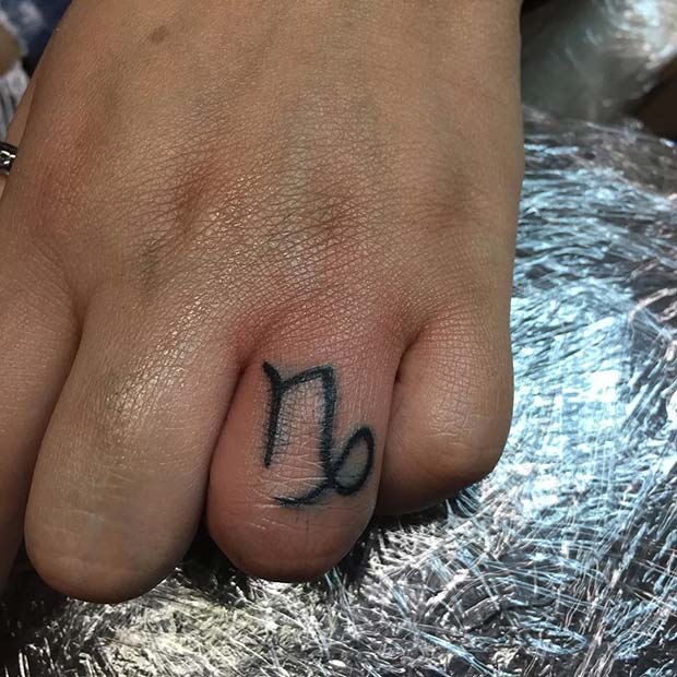 Star Sign Design Finger Tattoo 