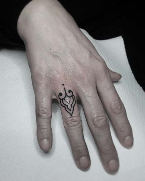37 Gorgeous Wedding Ring Tattoos - Psycho Tats