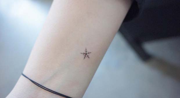 Snowflake Star Tiny Tattoo Idea