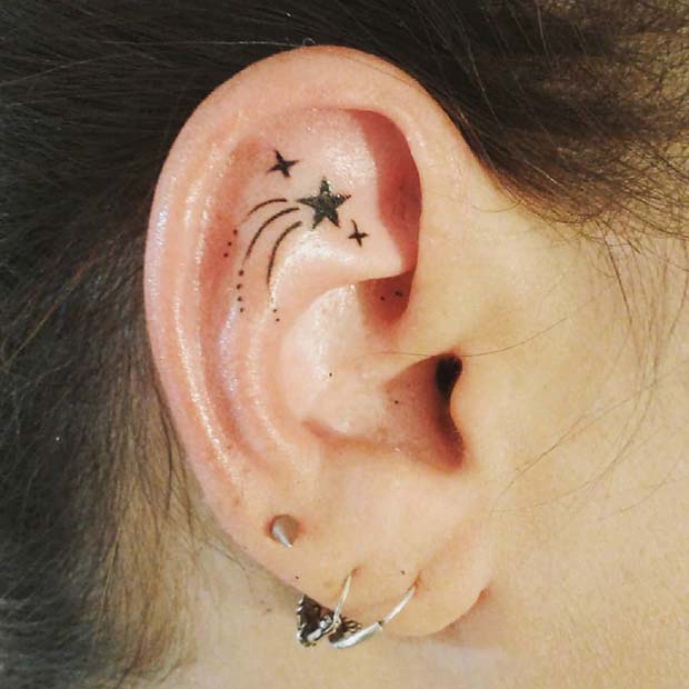 Unique Ear Star Tattoo Idea 