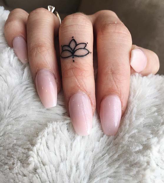 Lotus Flower Finger Tattoo