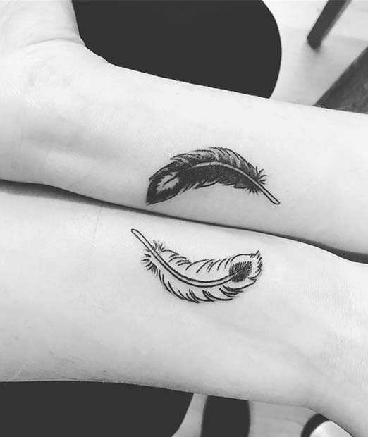 Creative Yin and Yang Feathers Tattoo Design 