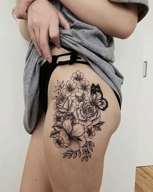 flower tattoo thigh