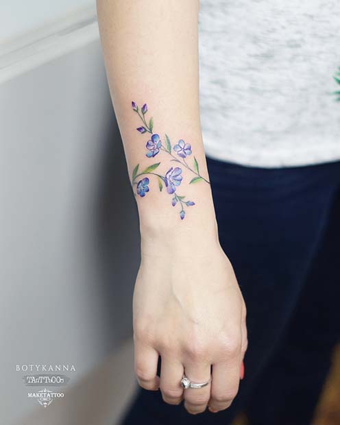 Right Wrist Flowers Girl Tattoo