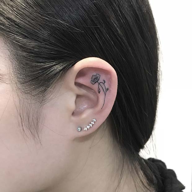 Small Poppy Ear Tattoo Idea