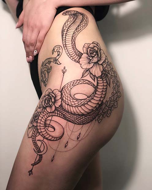 Statement Snake Hip Tattoo Idea