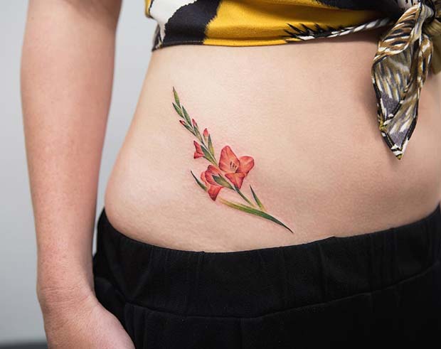 Delicate full rose and stem pelvic hip tattoo  Hip tattoo Pelvic tattoos  Bikini line tattoo