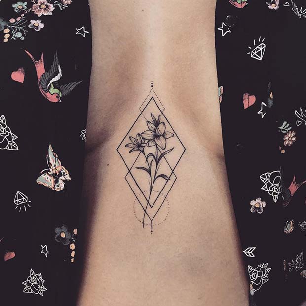 Lily Sternum Tattoo with Geometric Design