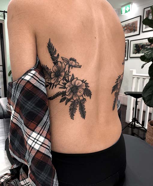 Flower Rib Tattoo Idea for Girls