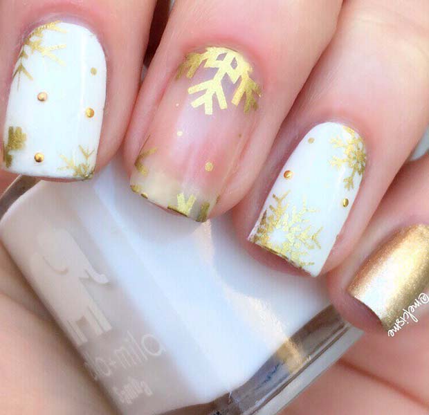 Gold Snowflake Nail Design