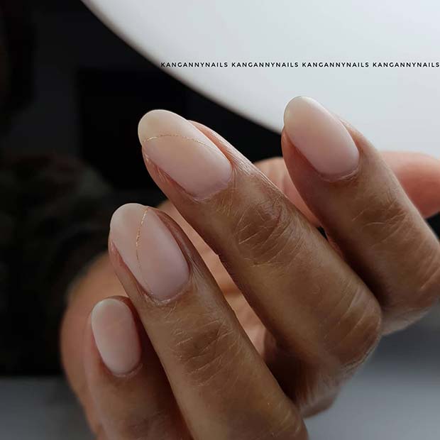 Light Nails with Subtle Gold