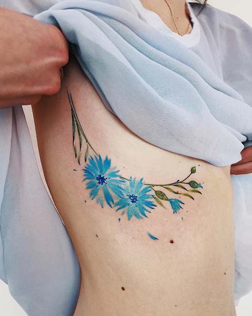 Vibrant, Rib Flower Tattoo Idea