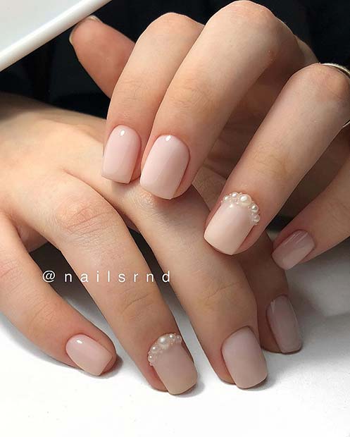 Elegant Nude Nails with Pearls