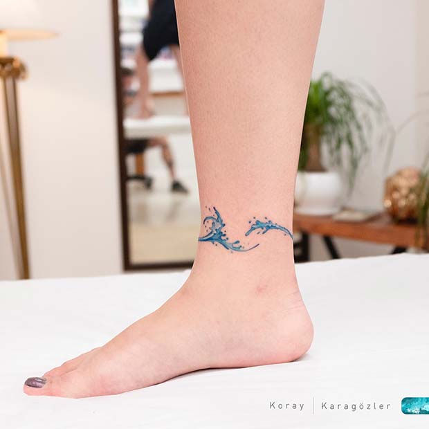 Wrap Around Ankle Tattoo 