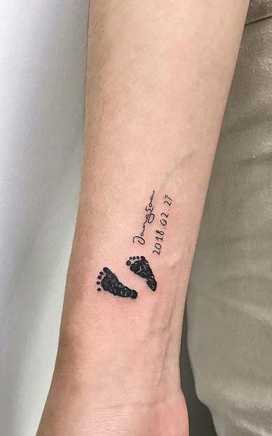 Small Footprints and Date Tattoo Idea
