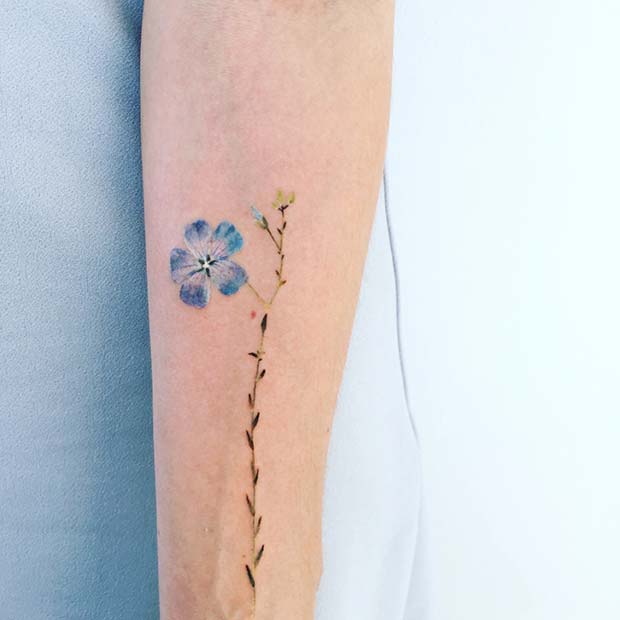 Small Blue Flower Tattoo
