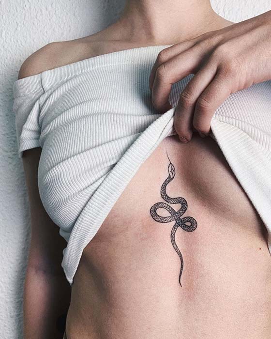 Stylish Snake Sternum Tattoo