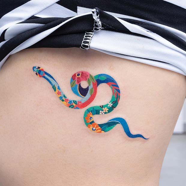 Vibrant Snake Rib Tattoo