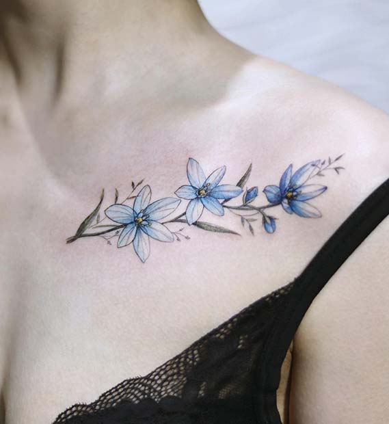 Beautiful Blue Flower Collar Bone Tattoo