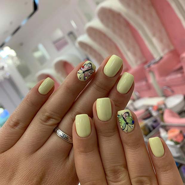 Pastel Yellow Nails with Butterflies