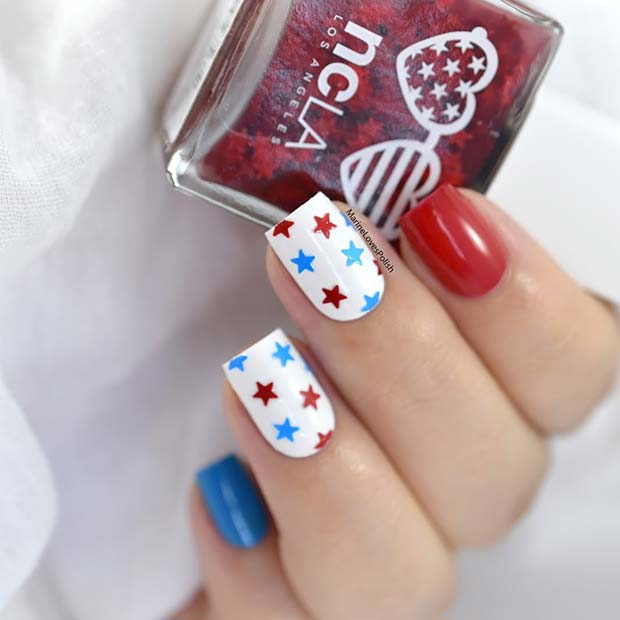 Red and Blue Stars on White Nails