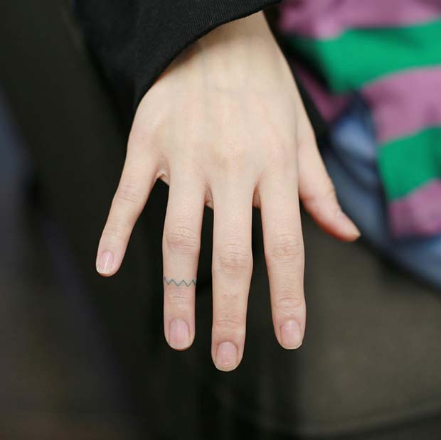 Trendy Zigzag Finger Tattoo