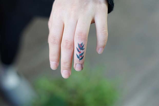 Bright Botanical Finger Tattoo