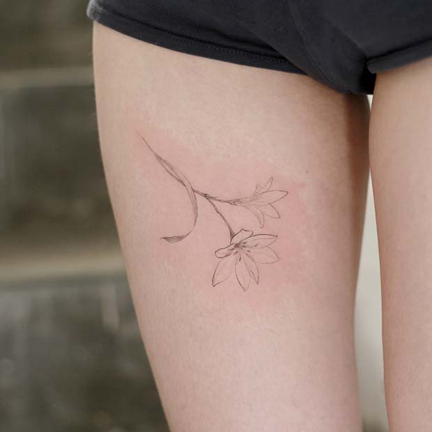 Subtle Lily Tattoo Design