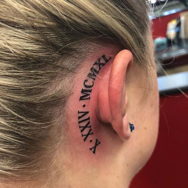 Roman Numerals Behind Ear Tattoo