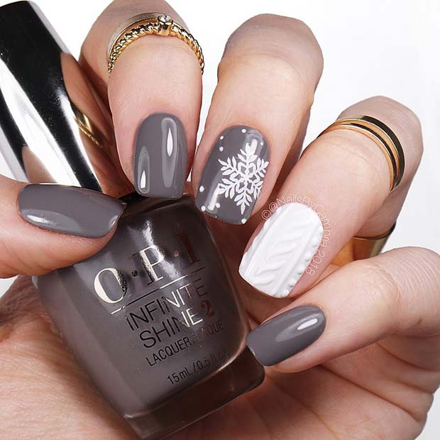 Grey Snowflake Nails with a White Knitted Accent Nail