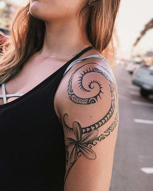 Arm Tattoo with a Patterned Swirl and Flowers