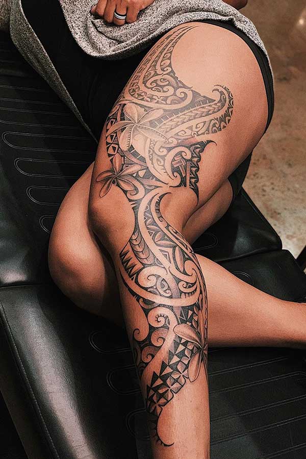 Beautiful Tribal Leg Tattoo with Flowers