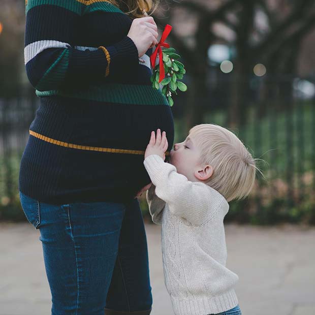 Christmassy Photo Announcement with Mom and Sibling to Be