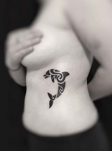 Dolphin Tattoo with a Tribal Pattern